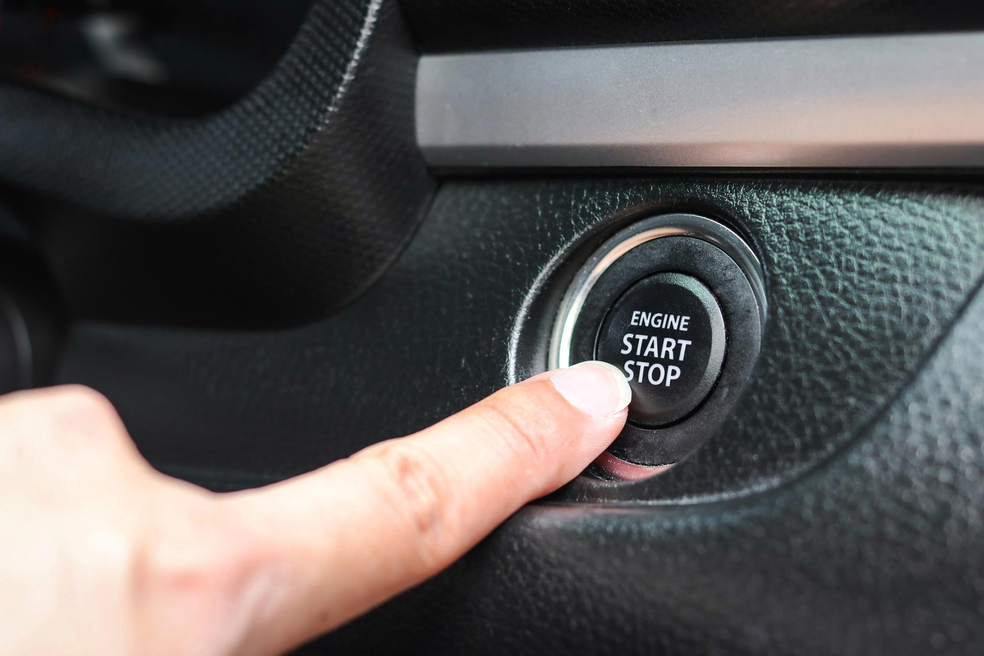 Automotive locksmith assisting with a push-to-start vehicle key system in Houston